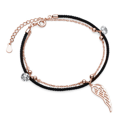 Rosa forgyldt armbånd med sort snor, vinge og zirkoner Rosa forgyldt armbånd med sort snor, vinge og zirkoner